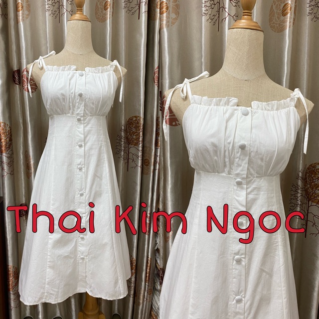 Đầm xoè 2 dây nhíu ngực phối nút bọc