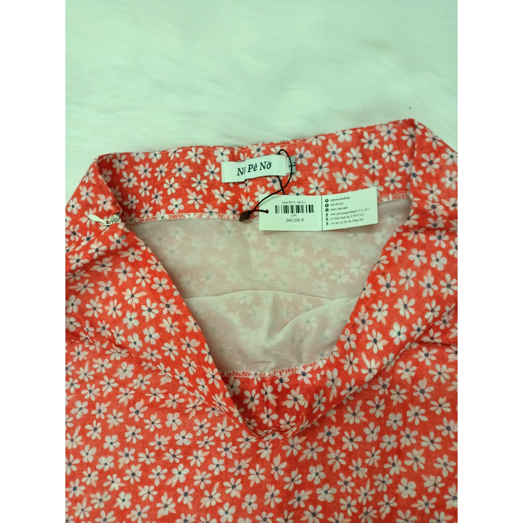 Chân váy hoa nhí màu cam đỏ của Nờ Pê Nờ  size L,  XL