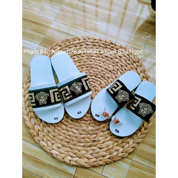 Dép nam nữ logo đầu người