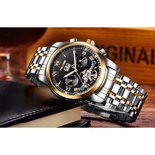 Đồng hồ cơ Tevise mặt tròn dây inox