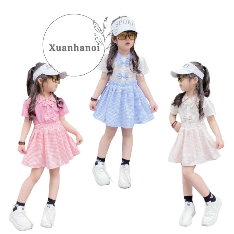 Set bé gái áo váy học sinh áo trắng cổ bẻ 2 nơ và chân váy kẻ caro liên quần XHN1002