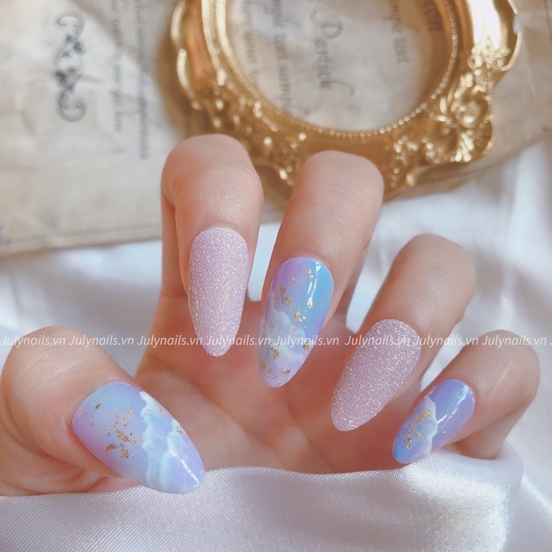 Nailbox thiết kế hình mây màu tím , rắc nhũ , loang màu xinh xắn