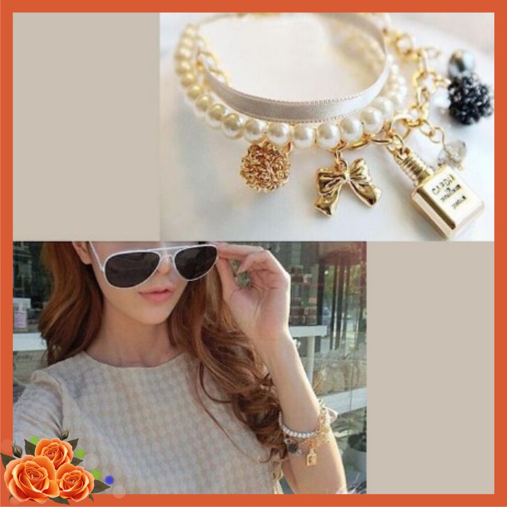 Vòng tay hạt châu nơ cung pha lê màu vang duyên dáng