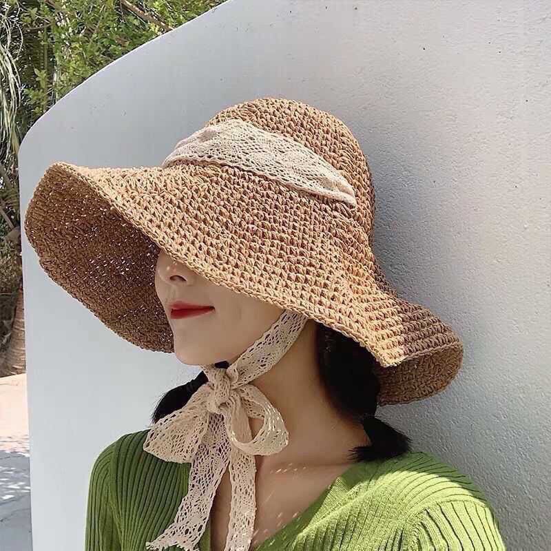 Mũ cói đi biển vành rộng thắt dây nơ ren trắng