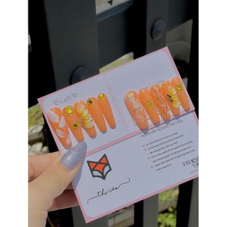 Móng úp form thang dài tone cam sữa