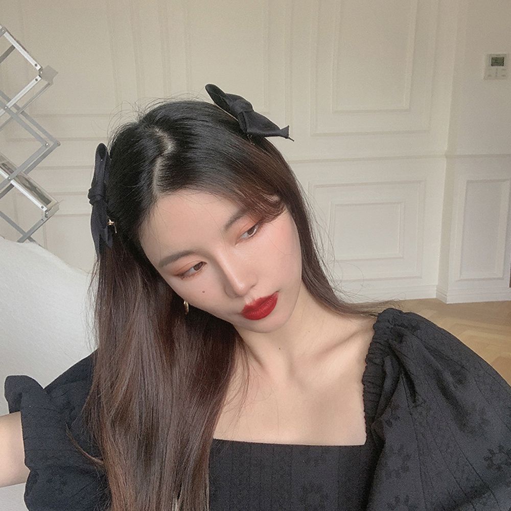 Kẹp tóc nơ đôi phối tua rua màu trơn phong cách Hàn Quốc dễ thương cho nữ