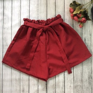 Quần short ống rộng kaki có nơ đỏ