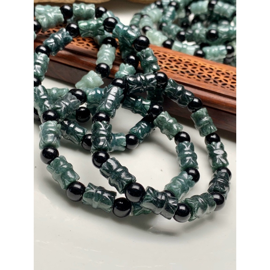 Vòng tay ống trúc chạm hoa sen đá cẩm thach lam