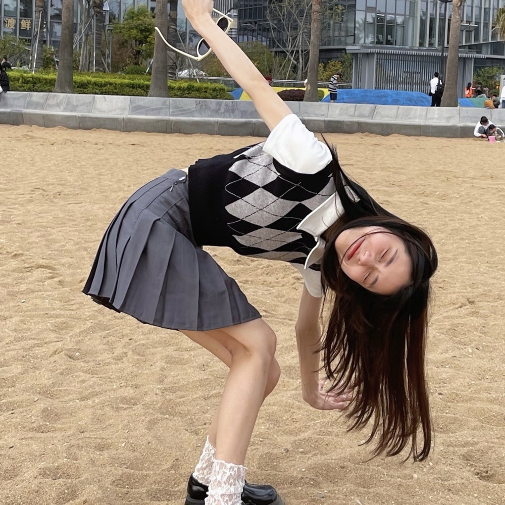 Áo len không tay cổ chữ v họa tiết kim cương thời trang cho nữ