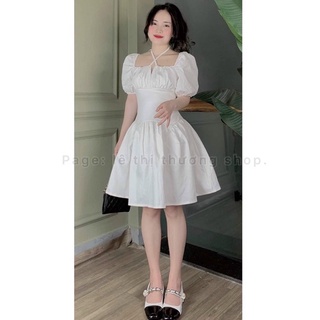 Đầm trắng đuôi cá dây chéo cổ