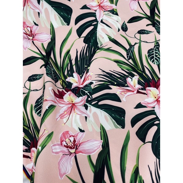 Vải lụa ngọc mai co giãn hoa lan nền cam nhạt