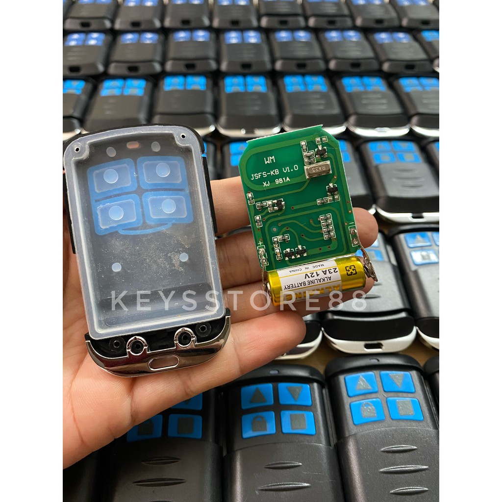 Tay khiển cửa cuốn học lệnh thông minh từ mã cố định tần số 433MHZ