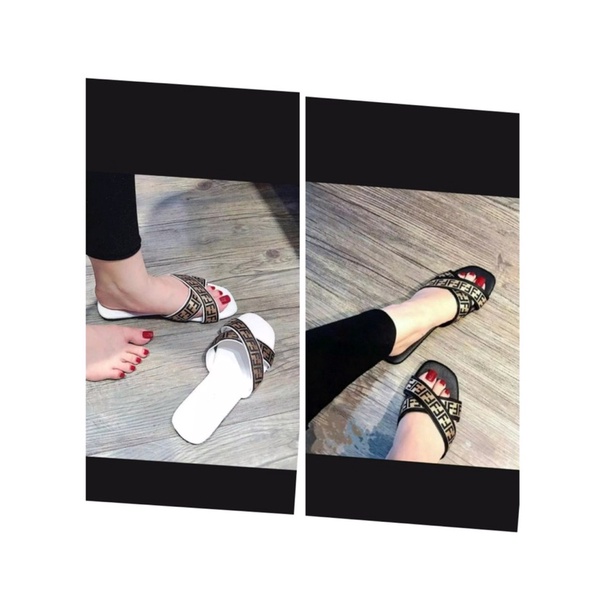 dép quai chéo đen fen dy nền trắng đầu tròn. bao bền đẹp. nắng mưa đều mang được. cam kết như hình. ( hình tự chụp )