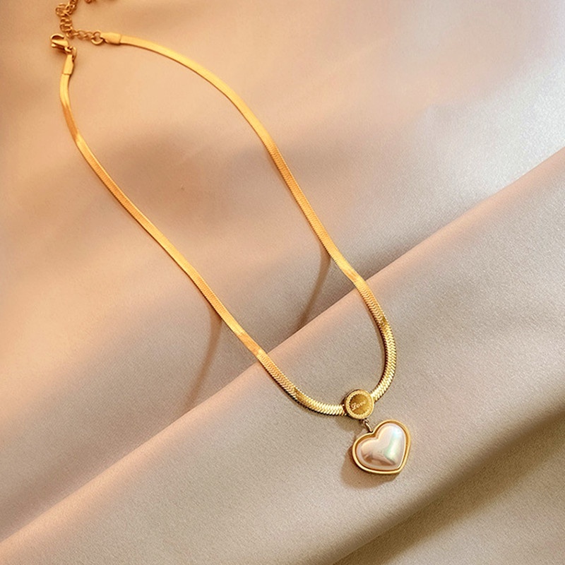 dây chuyền titan nữ 18k vàng chống gỉ Ngọc trai tim vòng cổ Phụ kiện thời trang