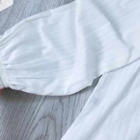 Sơ mi trắng cổ tròn tay bèo chất đũi mềm