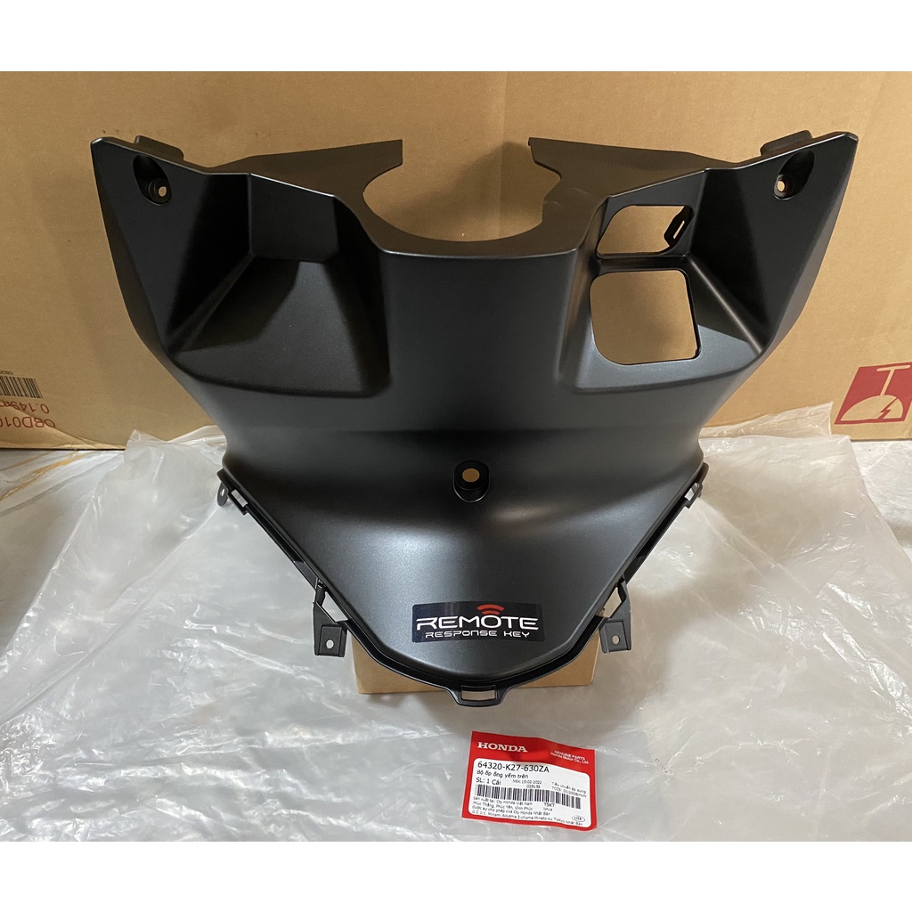 Ốp ống yếm trên - ốp ổ khóa HONDA AIR BLADE 125 năm 2014 màu Đen nhám. 64320K27630ZA