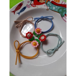Chun cột tóc nụ cười hoa mặt trời