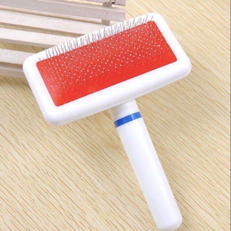 lược chải lông chấm bi cho chó mèo