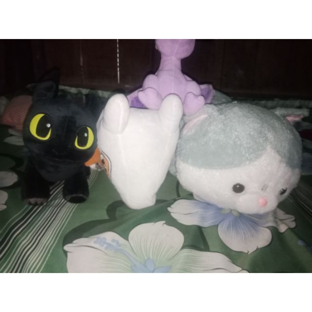 Gấu bông mèo nằm