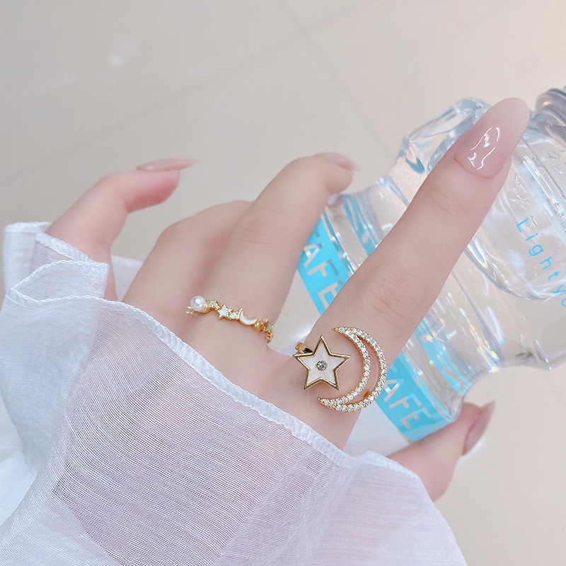 Nhẫn hở hình trăng sao đính ngọc trai xoay được phong cách Hàn Quốc