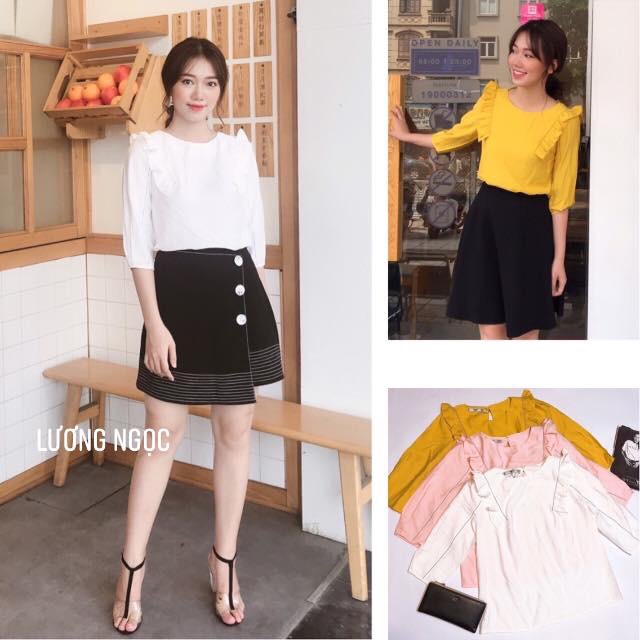 Chân váy chữ A trần chỉ phối cúc