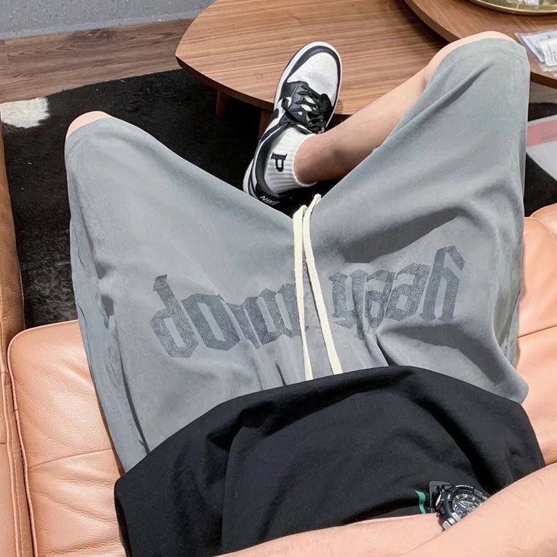 Quần Short Thể Thao Ống Rộng Màu Trơn Phối Dây Rút In Chữ Thời Trang Hàn Quốc Cho Nam