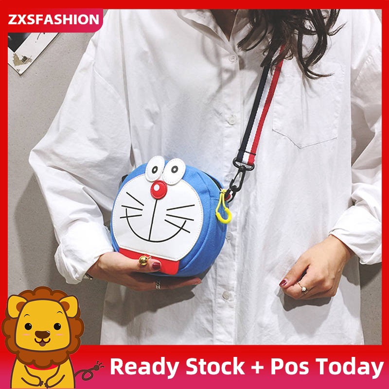 Túi đeo chéo vai bằng vải họa tiết Doraemon bắt mắt dễ thương