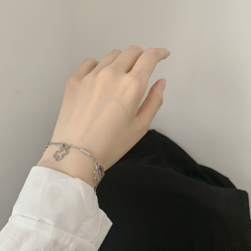 Vòng tay mắt xích màu bạc phối tua rua mặt thánh giá / gấu khoét rỗng làm quà tặng cho nữ | BigBuy360 - bigbuy360.vn