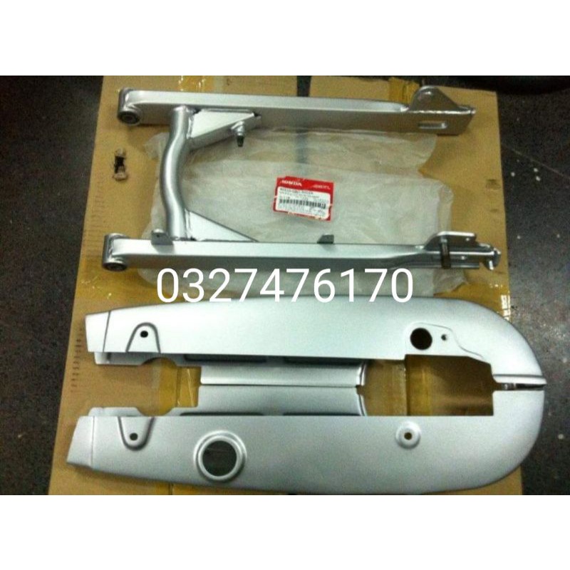 Bộ càng gắp hộp xích, cacte xe Super DREAM zin honda