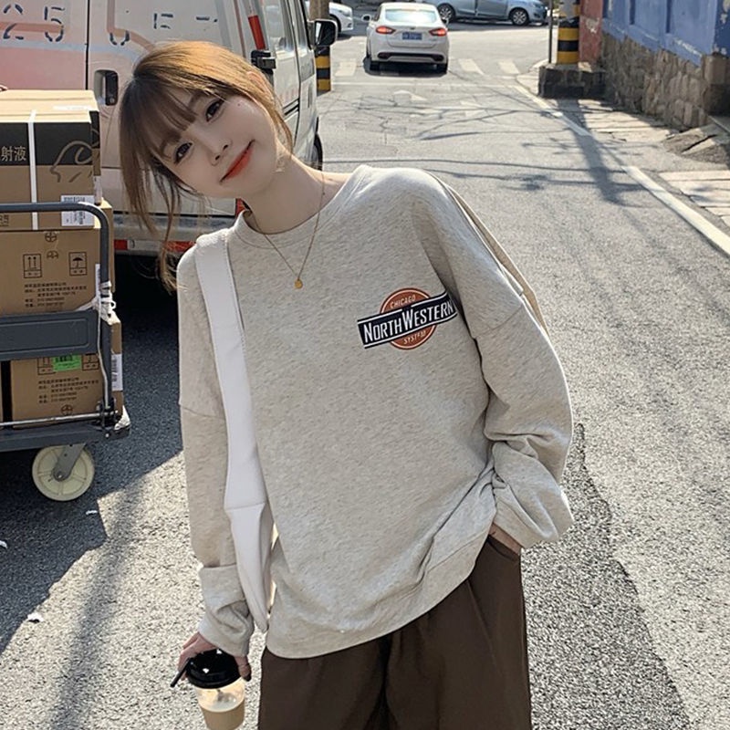 Áo thun nữ tay dài dáng rộng in hình mới