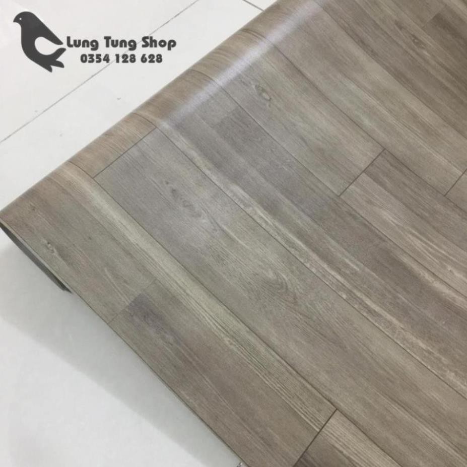 Thảm nhựa simili trải sàn vân gỗ xám - bề mặt nhám hiện rõ vân gỗ như thật