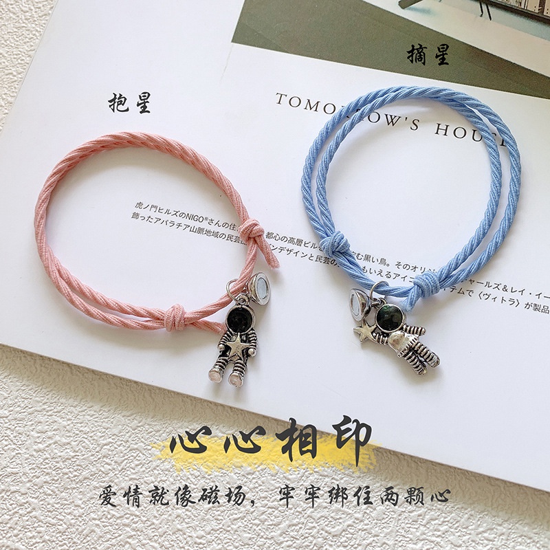 Cặp Dây Cột Tóc Nam Châm Hình Phi Hành Gia Độc Đáo