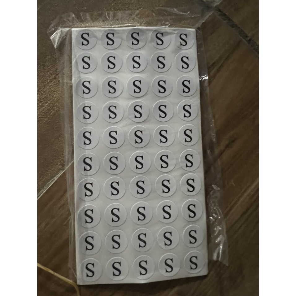 10 tờ tem size dán quần áo 1 tờ 50 tem*1 tập 10 tờ 500 miếng dán giá 3k