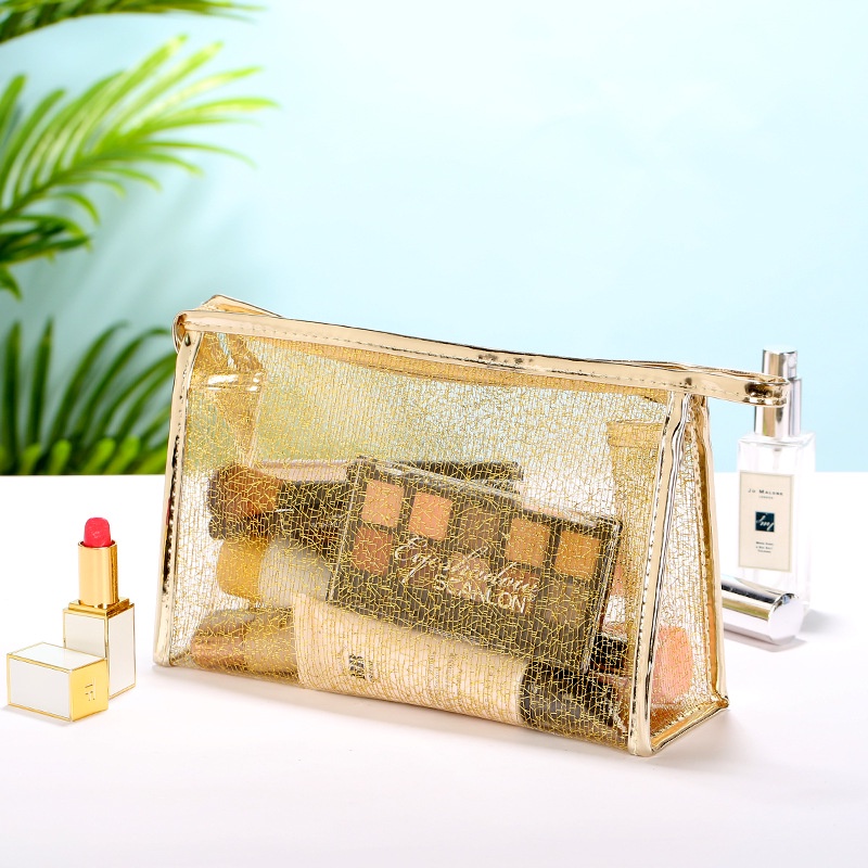 Túi đựng mỹ phẩm du lịch bằng nhựa TPU trong suốt hình vuông có khóa kéo màu vàng kim cho nữ