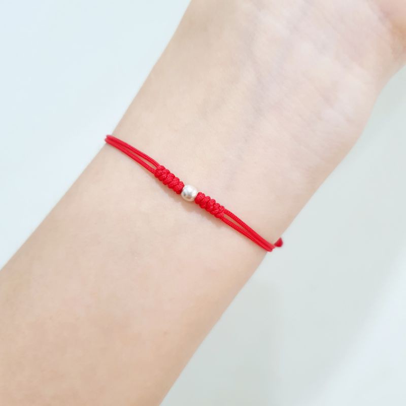 Lắc tay tết bi chỉ đỏ