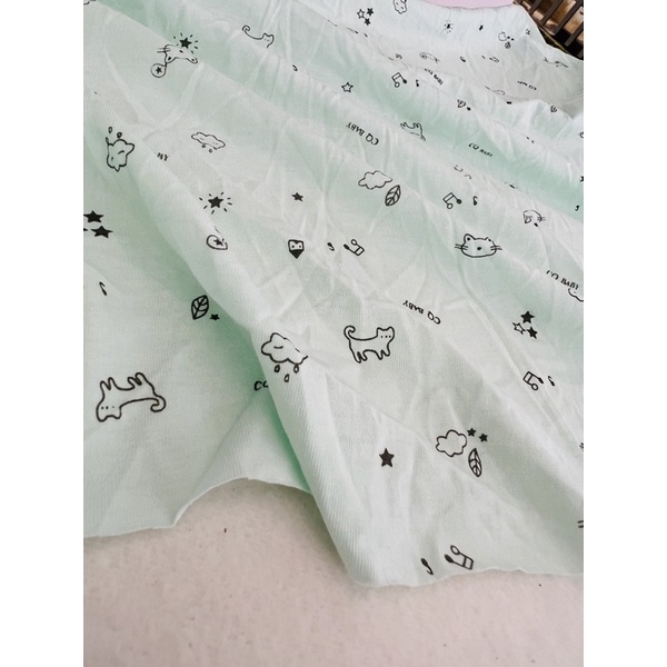 Vải thun cotton 2c hình baby nền xanh ngọc nhạt