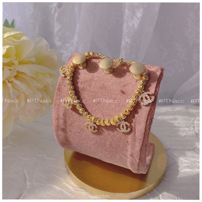 Lắc tay bi xi 2 màu trắng, vàng charm logo X, lắc bi charm thương hiệu sang trọng .PTNACC.