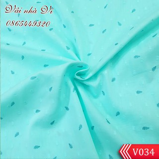 Vải thô mặt lụa nảy hạt họa tiết lá nhí nền xanh nhạt (Hàng mới về)- V034