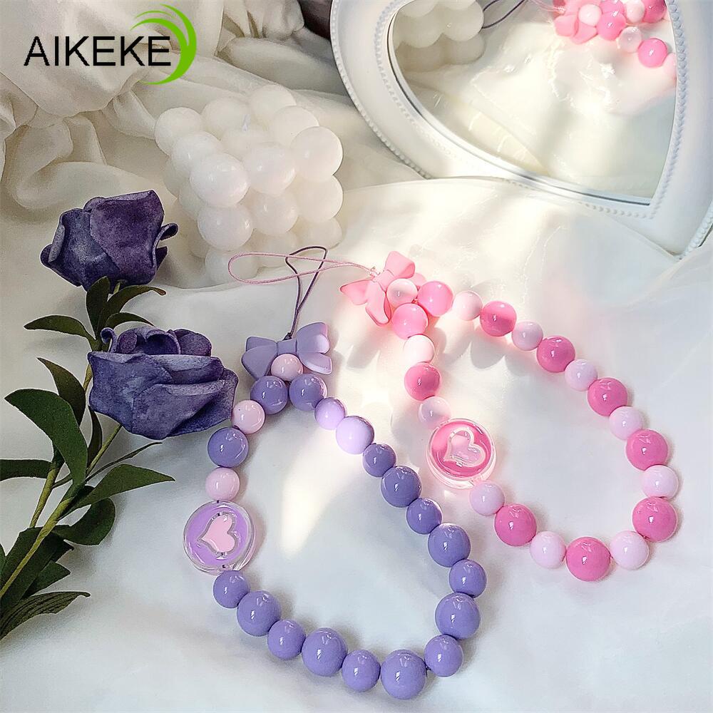 Dây Đeo Điện Thoại Chuỗi Hạt Hình Nơ Trái Tim Màu Macaron Mềm Chống Thất Lạc