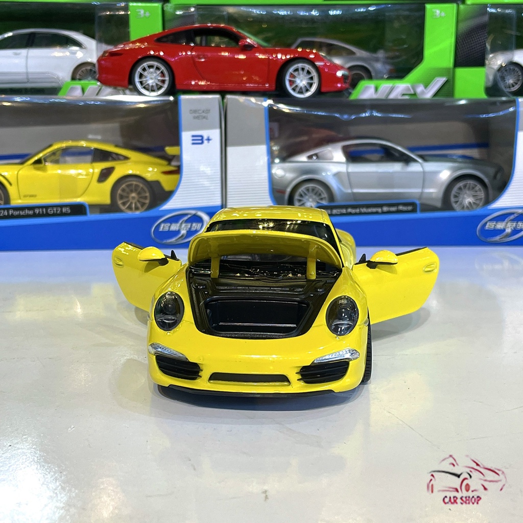 Mô hình xe ô tô Porsche 911 Carrera S Hãng Welly tỉ lệ 1:24 màu vàng