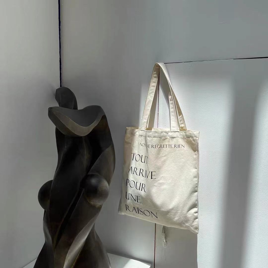 Túi tote vải canvas đi học đi chơi có khóa kéo hàn quốc đeo vai in TOUT ARRIVE POUR UNE RAISON AH1654