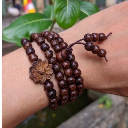 chuỗi hạt 108 cỡ hạt 6ly gỗ vân mun đuôi công vòng tay nữ mix charm hoa sen
