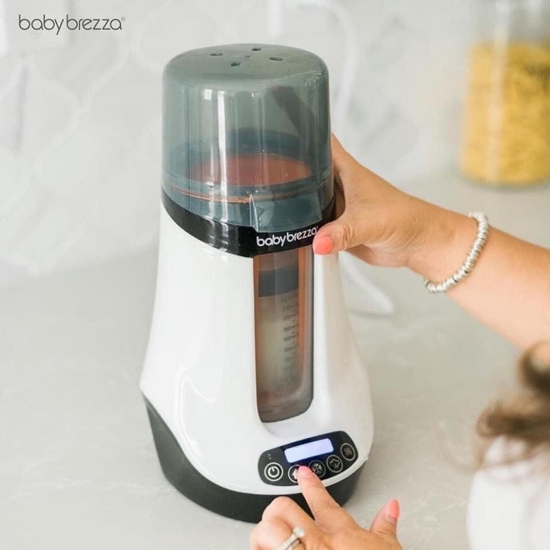 Máy Hâm Sữa Baby Brezza( Tặng kèm túi trữ sữa)