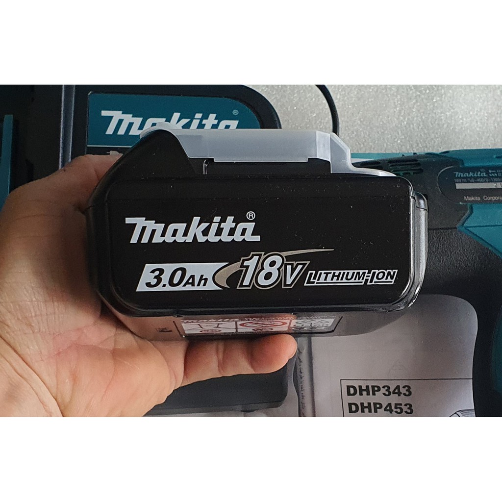 Máy khoan búa và vặn vít dùng pin MAKITA DHP453SFX8 ( 18V)