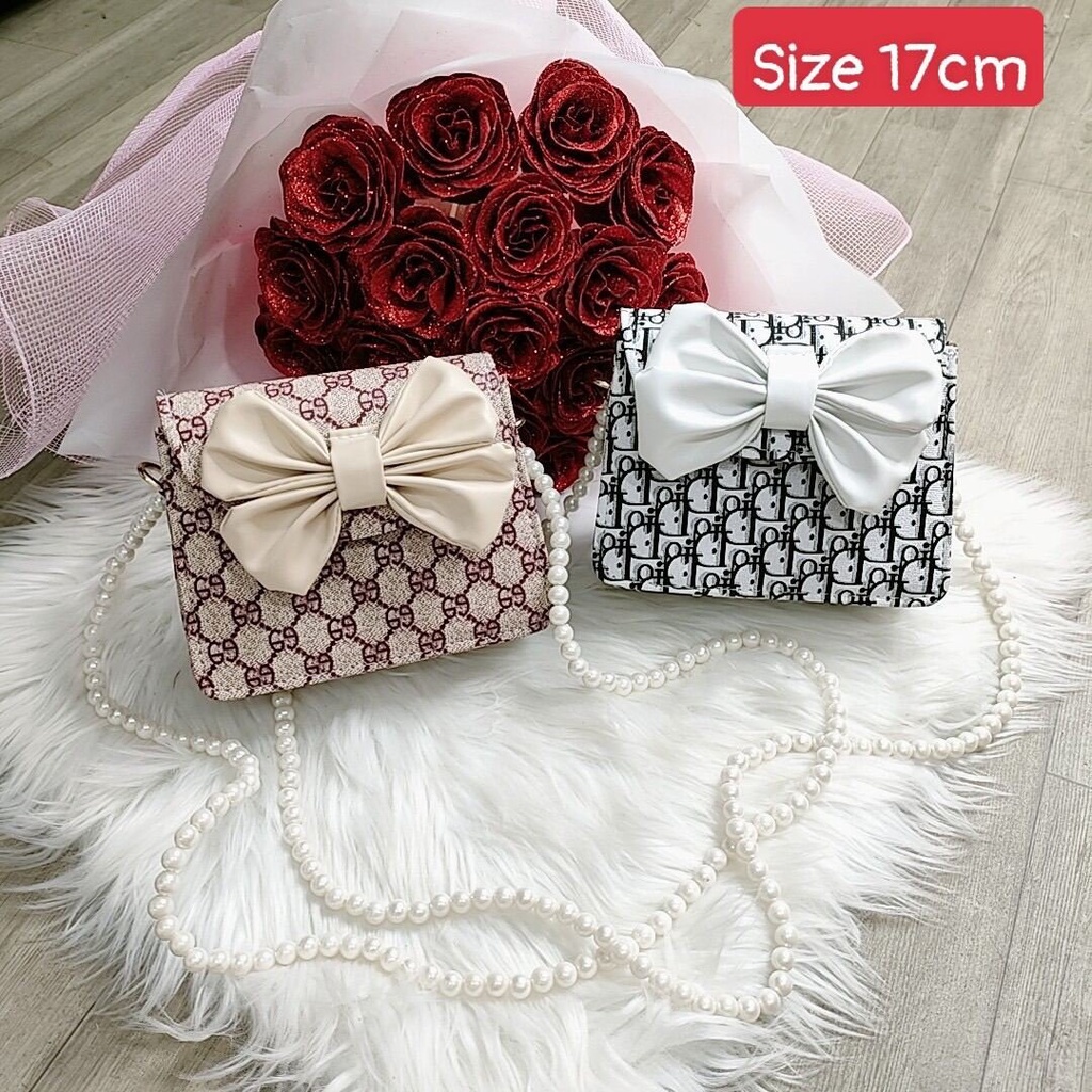 Túi đeo chéo đeo vai hai màu dây ngọc đính nơ phong cách hàn quốc