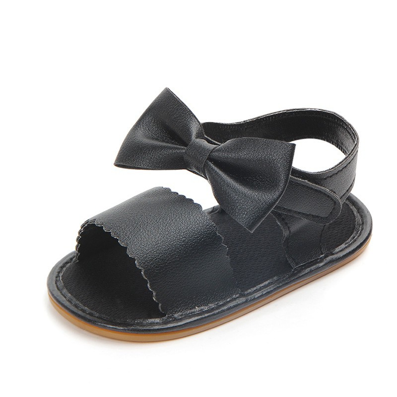 Giày sandal da PU đính nơ đế mềm cho bé gái