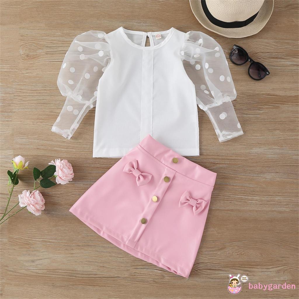 Bộ áo sơ mi trắng tay dài + chân váy đính nơ họa tiết chấm bi phối nút vàng thời trang cho bé gái 1-6 tuổi