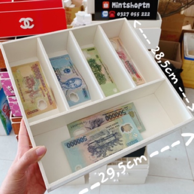 Khay chia tiền thu ngân màu trắng tiện dụng .