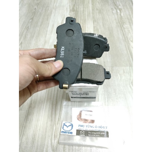 Má phanh trước Mazda 2 2012-2019