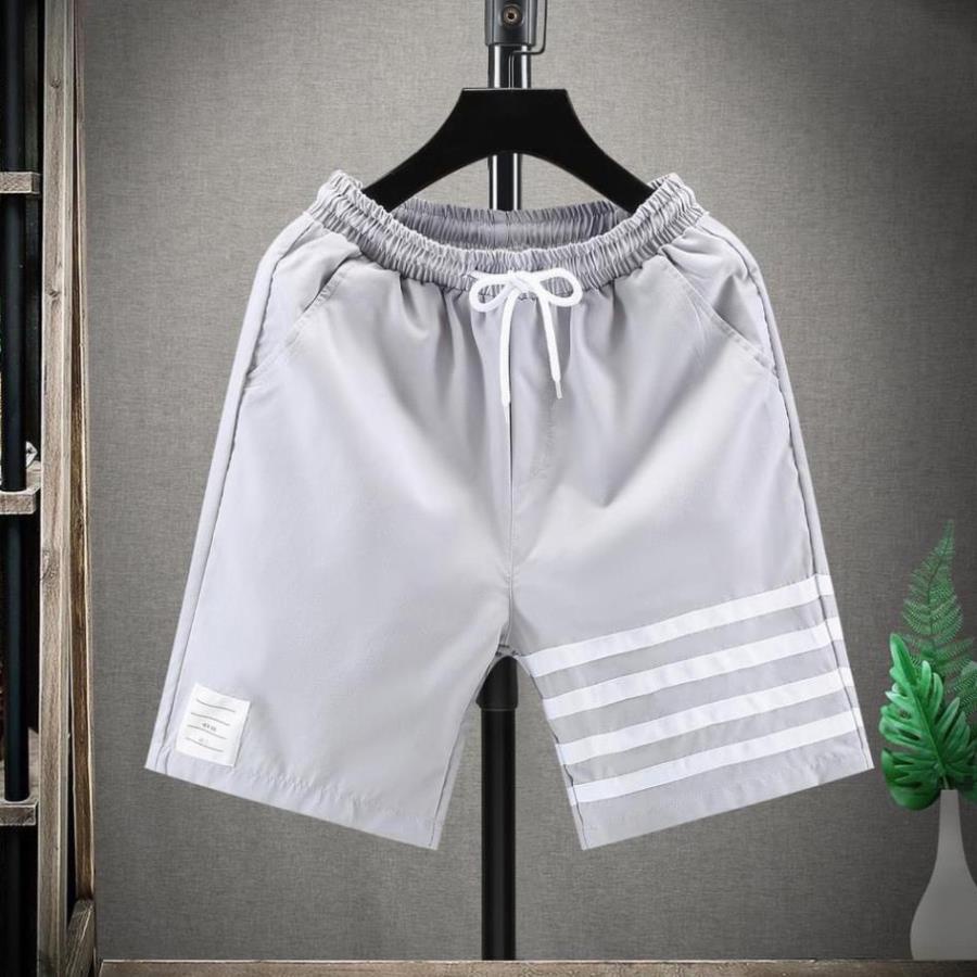 Quần đùi nam phong cách thế thao, quần ngố Thome 4 sọc thời trang nam cực chất.